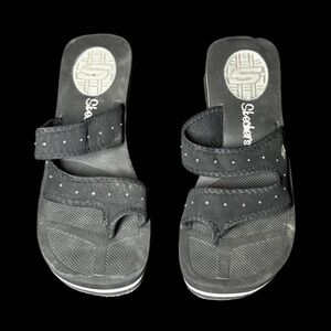 Black Skechers sandals with gem details